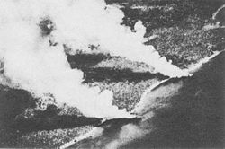 Two Japanese transports beached on Guadalcanal and burning on November 15