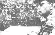 As Major General, Suharto (at right, foreground) attends funeral for assassinated generals 5 October 1965. (Photo by the Department of Information, Indonesia)