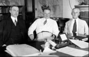In this 1926 photo, William P. McCracken, assistant secretary of commerce for civil aviation, is shown with Secretary Hoover (center) and assistant secretary of commerce Walter Drake.