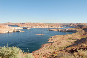 This is the southwestern portion of Lake Powell, which lies in Arizona. The back of Glen Canyon dam can be seen to the right in this image.