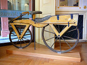 Wooden Dandy horse (around 1820), the first two-wheeler and as such the archetype of the bicycle