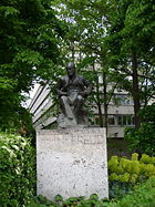 Sigmund Freud memorial in Hampstead, North London. Sigmund and Anna Freud lived at 20 Maresfield Gardens, near to this  statue. Their house is now a museum dedicated to Freud's life and work. [1] The building behind the statue is the Tavistock Clinic, a major psychiatric institution.