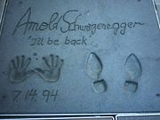 Footprints and handprints of Arnold Schwarzenegger in front of the Grauman's Chinese Theatre.