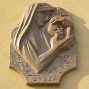 Memorial plaque dedicated to Mother Teresa at a building in Wenceslas Square in Olomouc, Czech Republic.