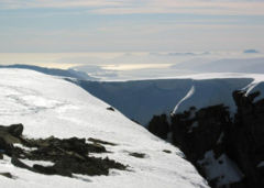 View south-west from the summit in early April. When the cliff edges are corniced, accurate navigation is critical.