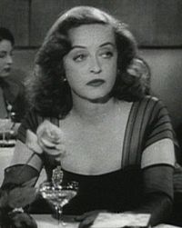 As Margo Channing in All About Eve (1950)