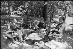 Anwar Sadat, Jimmy Carter, and Menachem Begin meet on the Aspen Lodge patio on September 6, 1978.