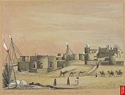 Part of the town of Karachi, with mud houses; camels and villagers in foreground. April 1851