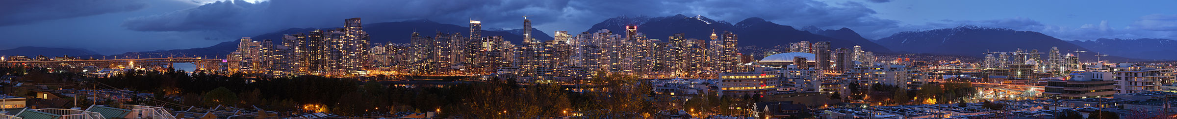 A high resolution panorama of Vancouver with the mountains behind as viewed from the south