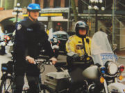 Vancouver police officers from the bicycle and motorcycle squads, on the streets of Gastown.