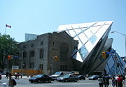The Royal Ontario Museum.  Note the contrast between the historic, brown stone part of the building and the newer, sharp-edged steel and glass addition.