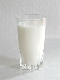 A glass of pasteurized cow milk.
