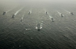 Military exercises often help increase strategic cooperation between countries. Shown here are Indian Navy, JMSDF and U.S Navy ships in formation, during a trilateral exercise in 2007.