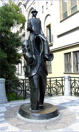 Bronze statue of Franz Kafka in Prague.