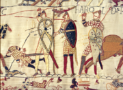 Three soldiers on the Bayeux Tapestry bearing pre-heraldic shields.