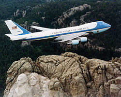 Air Force One flying over Mt. Rushmore