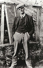 Photograph of James Joyce taken by fellow University College student Constantine P. Curran in the summer of 1904. When asked later what he was thinking at the time, Joyce replied 'I was wondering would he lend me five shillings' (in Ellmann).