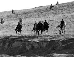 U.S. Forces work with the Northern Alliance on Horseback on November 12.