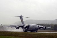 A USAF C-17 Globemaster returns to base from a humanitarian drop.
