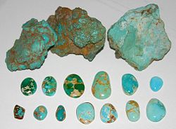 Untreated turquoise, Nevada USA. Rough nuggets from the McGuinness Mine, Austin; Blue and green cabochons showing spiderweb, Bunker Hill Mine, Royston