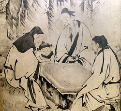 In many East Asian cultures, Go was considered one of the most important skills a civilized person could learn. This 16th century screen by Kano Eitoku (狩野永徳) shows Chinese Go players in the Ming Dynasty.
