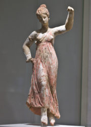 A dancing maenad.  This is a Greek statuette from the 3rd century BC.  It was made in Taranto