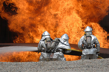 U.S. Air Force Airmen from the 20th Civil Engineer Squadron Fire Protection Flight neutralize a live fire during a field training exercise.