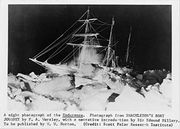 The Endurance at night during Ernest Shackleton's Imperial Trans-Antarctic Expedition in 1914.