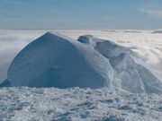 Snow cornices on a ridge top