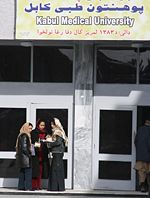 Female students chat outside Kabul Medical University.