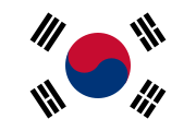 The flag of South Korea, with Taegeuk in the centre with four trigrams representing Heaven, Water, Earth, and Fire (beginning top left and proceeding clockwise).