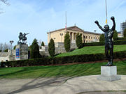 Two statues, The Amazon and Rocky, outside the Philadelphia Museum of Art.