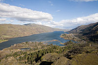 Dams on the Columbia have transformed the river into a series of slackwater pools, such as this one between Bonneville and The Dalles, as seen from Rowena Crest.