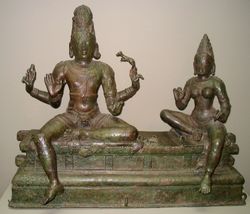 This 14th-century statue from south India depicts the gods Shiva (on the left) and Uma (on the right). It is housed in the Smithsonian Institution in Washington, D.C..