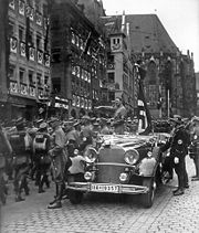 Parade of SA troops past Hitler. Nuremberg, November 1935.