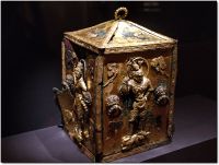 A gilt Buddhist reliquary with decorations of armored guards, from Korean Silla, 7th century