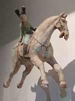 A Tang woman playing polo on a horse, 8th century