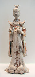 A terracotta sculpture of a lady, 7th-8th century; during the Tang era, female hosts gathered feasts, tea parties, and played drinking games with their guests.