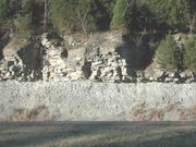 Two types of sedimentary rock: limey shale overlain by limestone. Cumberland Plateau, Tennessee