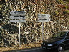 Corsican nationalists sometimes shoot or spray on the traffic signs, damaging the French version of names