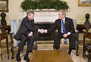 Secretary General Jaap de Hoop Scheffer meeting George W. Bush on March 20, 2006.