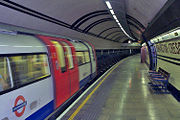 A London Underground 1995 Stock train pulls into Mornington Crescent station on the Northern line.