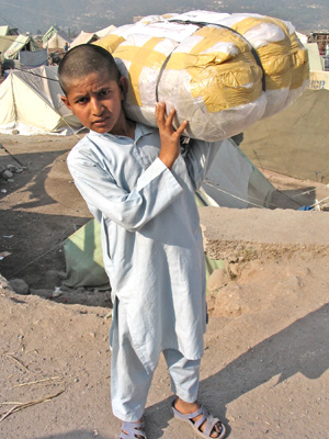 Kashmir Boy with SOS Children Supplied Relief Package