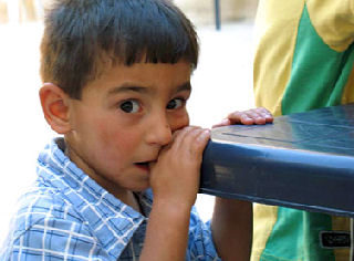 Boy at the refugee centre in Damascus