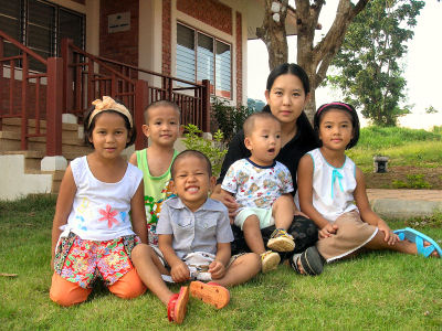 Children and their mother, SOS Children's Village Chiang Rai, Thailand