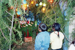 Children in Bolivia enjoying the Christmas tree