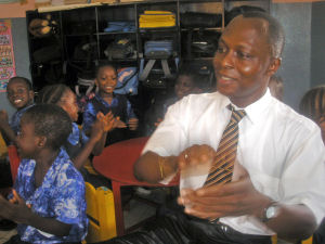 Former SOS child and National Director takes part in nursery class with children at Freetown
