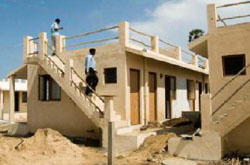 Community homes being rebuilt in Akkampettai, India