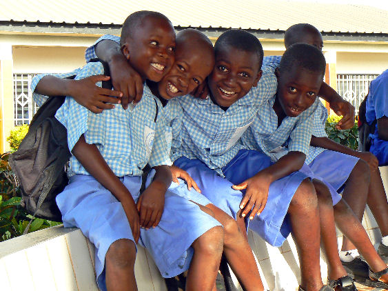 SOS children (primary school) cheeky smiles for camera
