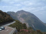 In the distance, Mt. Unzen’s Fugen (left) and Heisei-Shinzan peaks, the latter a lava dome that emerged during the 1990–1995 eruption, seen from Nita Pass in November 2005